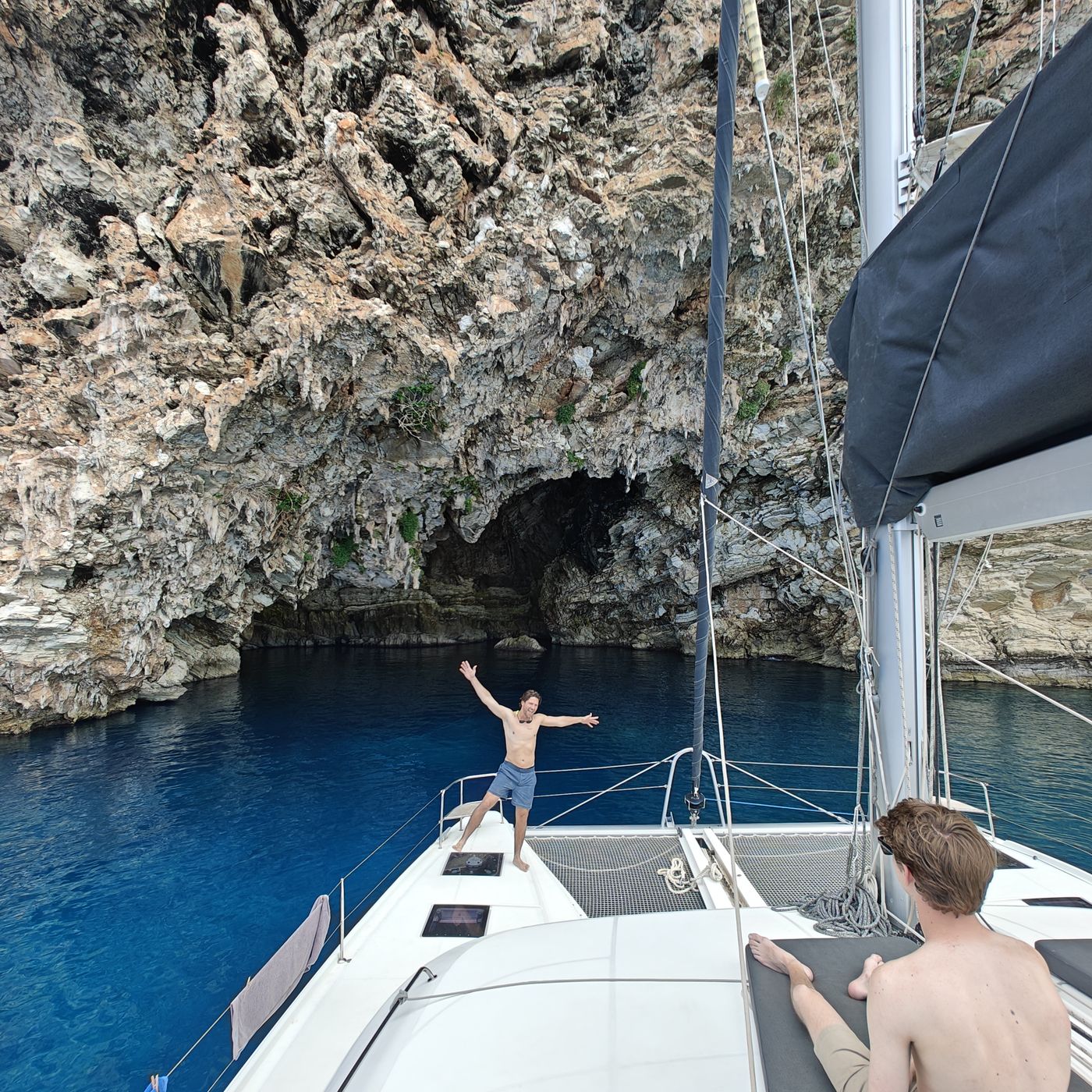 Deep blue cove with cliff cave
