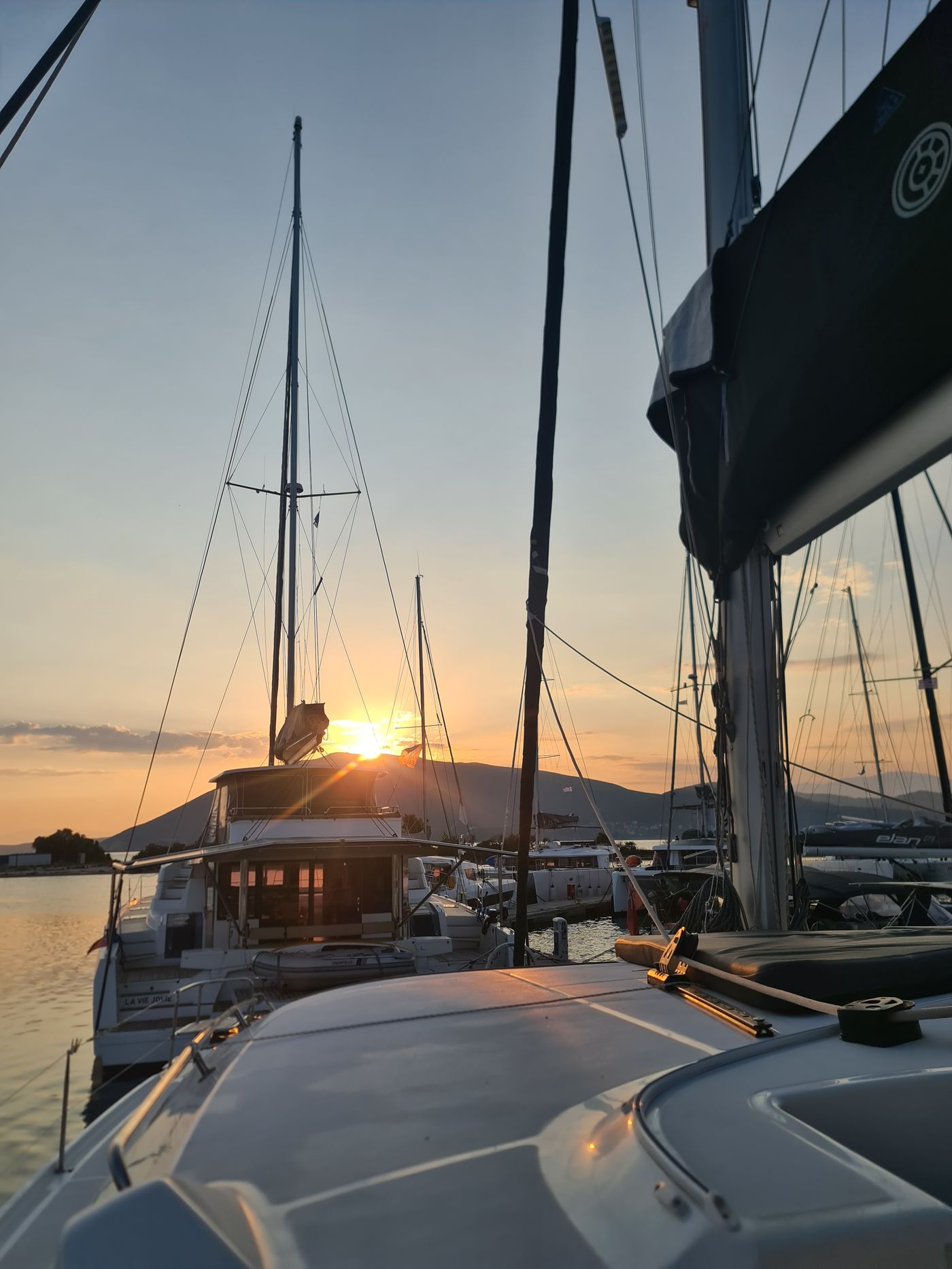 Sailing yachts in the marina at sunrise